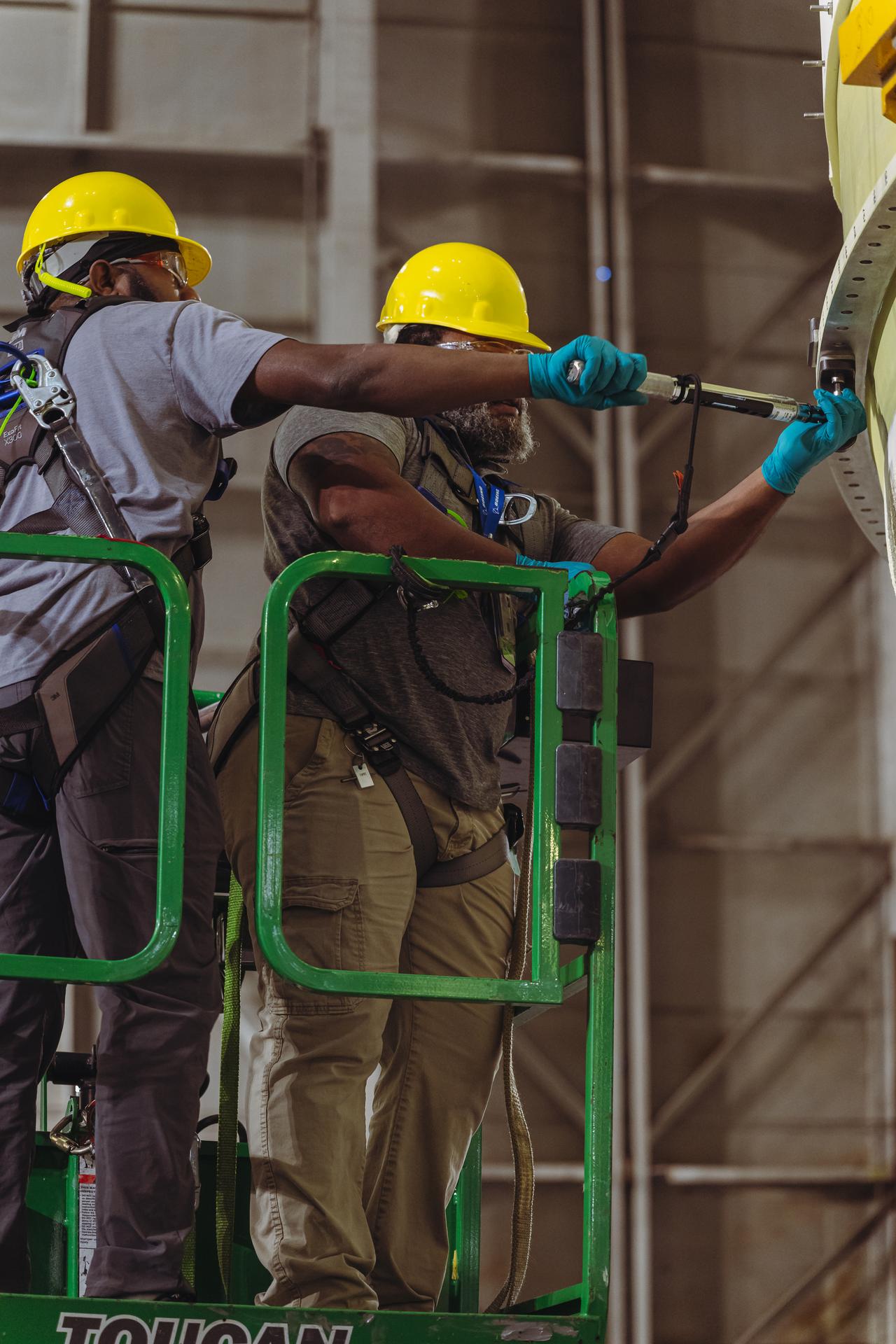 The liquid oxygen tank for NASA’s SLS (Space Launch System) rocket core stage for the Artemis III mission is lifted into a production cell at the agency’s Michoud Assembly Facility in New Orleans on Nov. 7. Move crews use an overhead crane system to lift the tank from the mobile transporter, which carried it from another area of the factory and set it atop the previously loaded intertank. Once the liquid oxygen tank is mated to the intertank, team will mate the stage’s forward skirt atop the tank to complete the forward join.   The propellant tank is one of five major elements that make up the 212-foot-tall rocket stage. The core stage, along with its four RS-25 engines, produce more than two million pounds of thrust to help launch NASA’s Orion spacecraft, astronauts, and supplies beyond Earth’s orbit and to the lunar surface for Artemis.